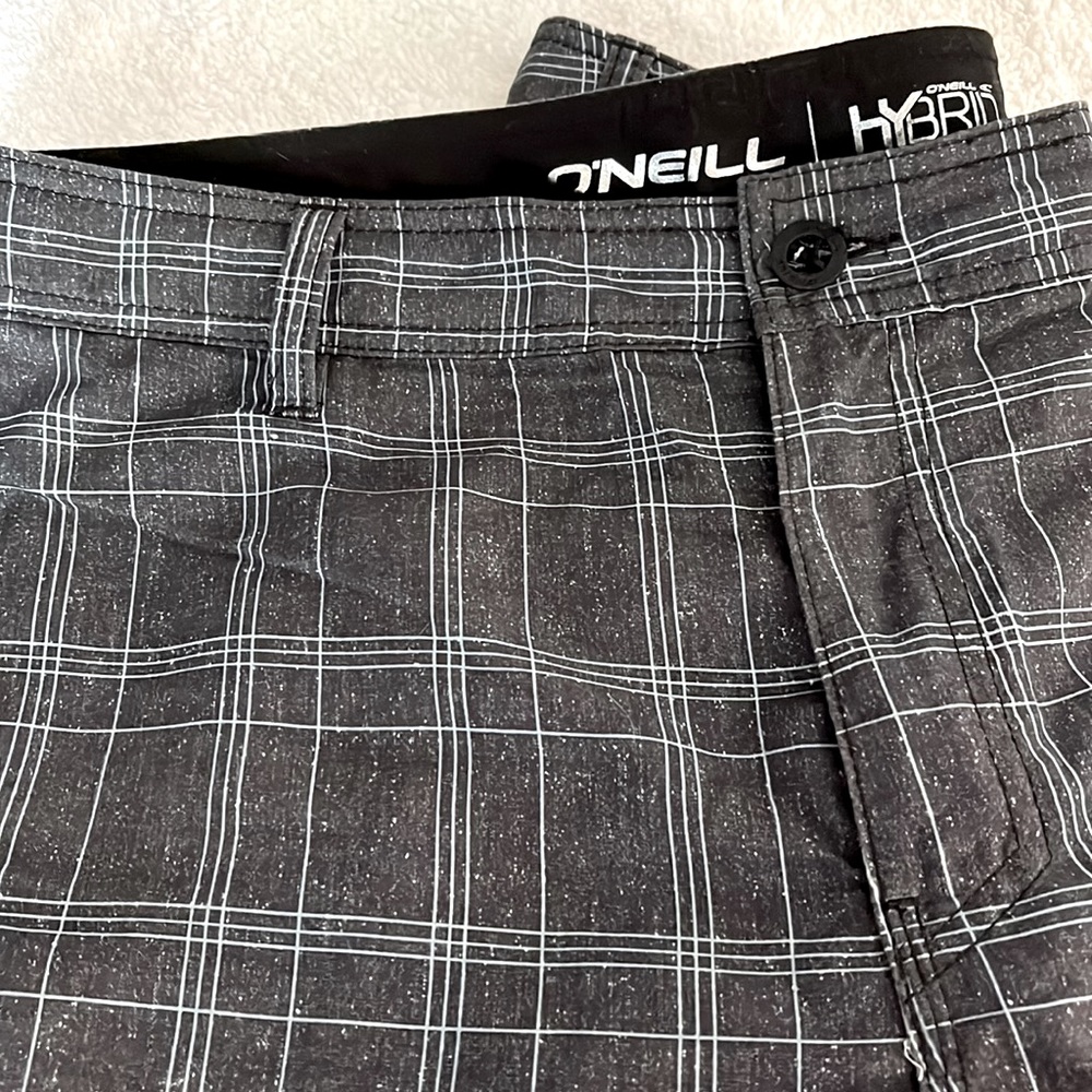 O’Neill black/blue stripe hybrid shorts/surf trunks.
